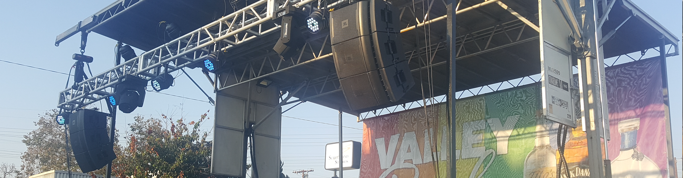 Speakers rigged to stage at Pride event