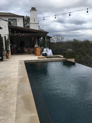 Camille Styles' patio with pool and bistro lights