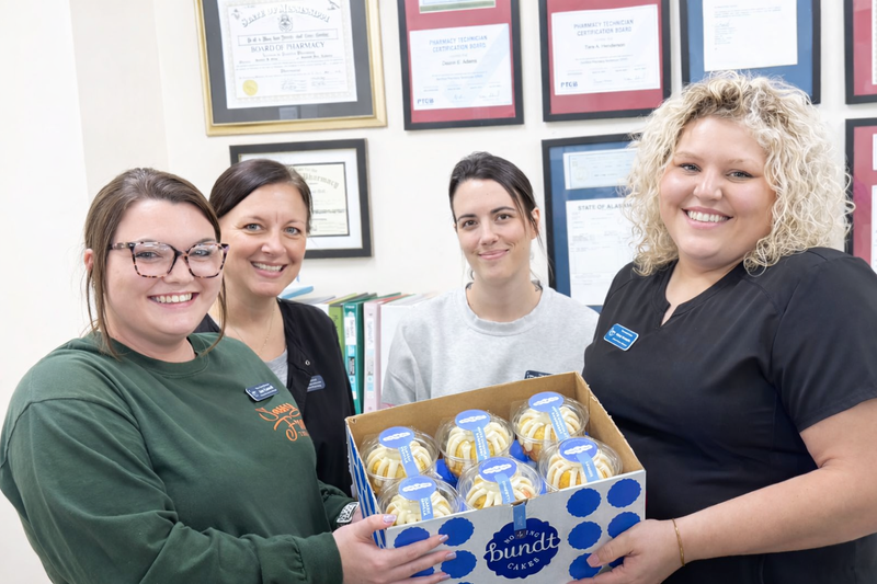 Pharmacy staff with Bundt Cakes treat.png