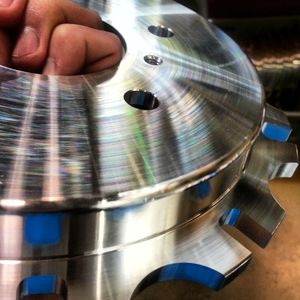 Surface finish on a 7075 Turned component brake rotor component