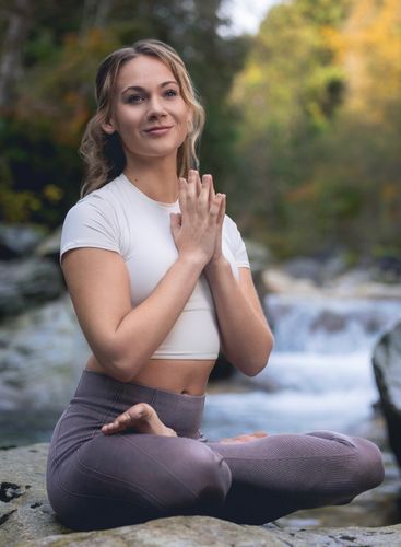 Chloe Groudas LMT, ERYT 500, Certified Hot Asana Assist, a Certified Massage Therapist, Certified Yin Yoga Teacher and Hot Asana Yoga University Lead Trainer Chloe Groudas