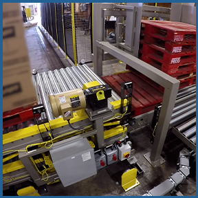 Transfer car with over-under conveyor to transport loads and pallets simultaneously.