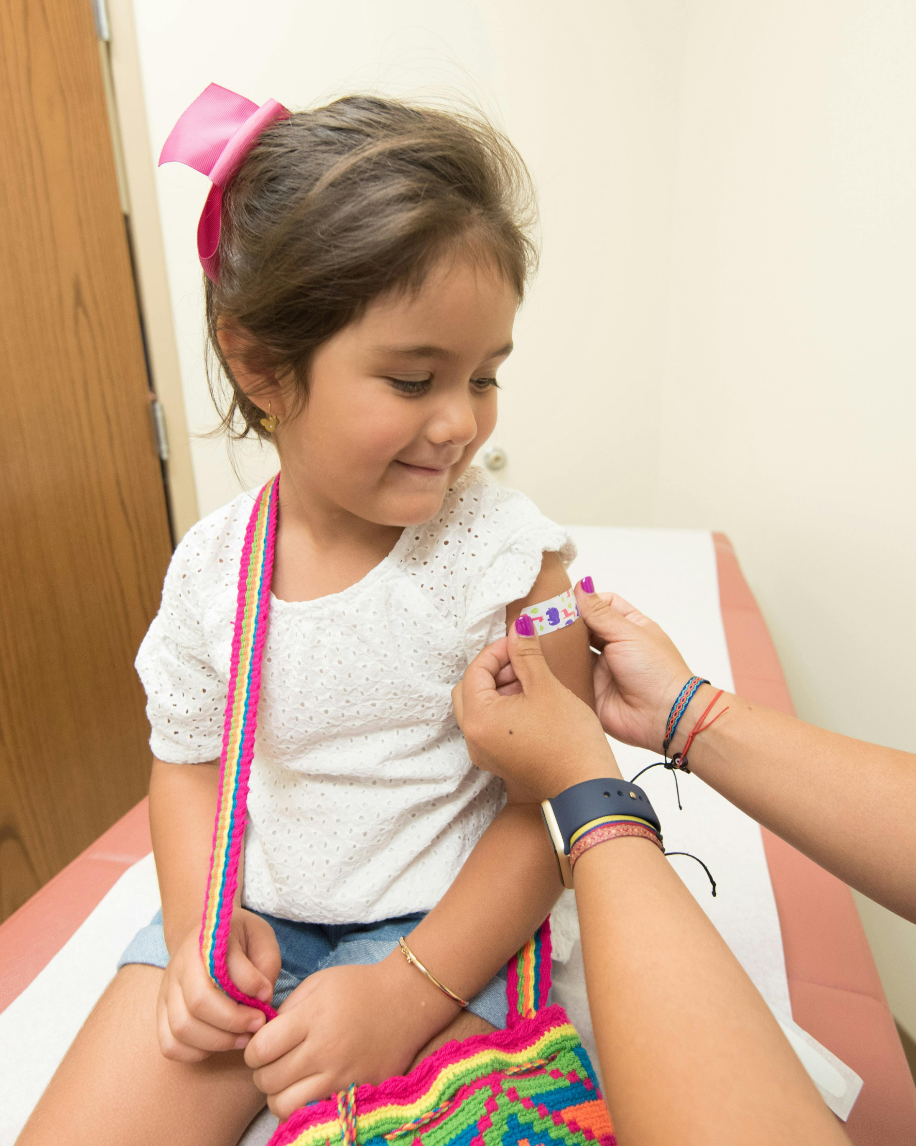 Pharmacist preparing the MMR (Priorix) vaccine