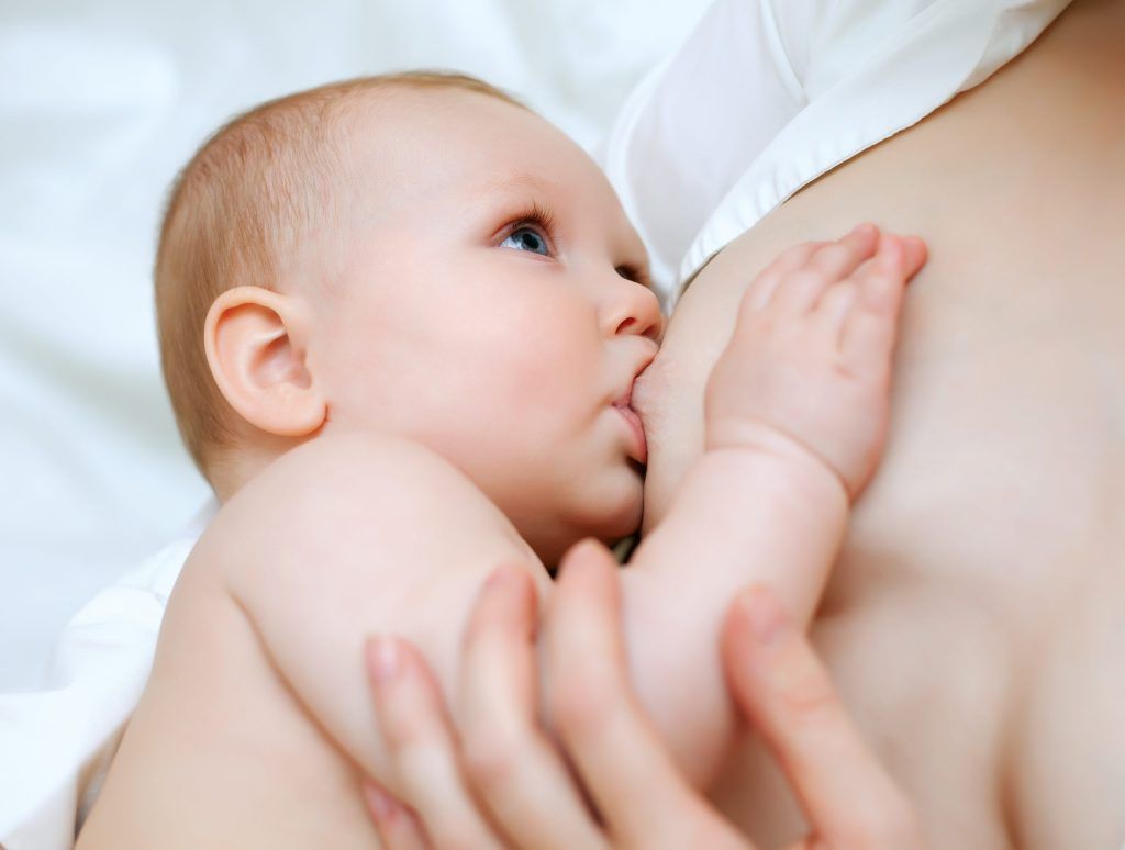 Mother nursing baby