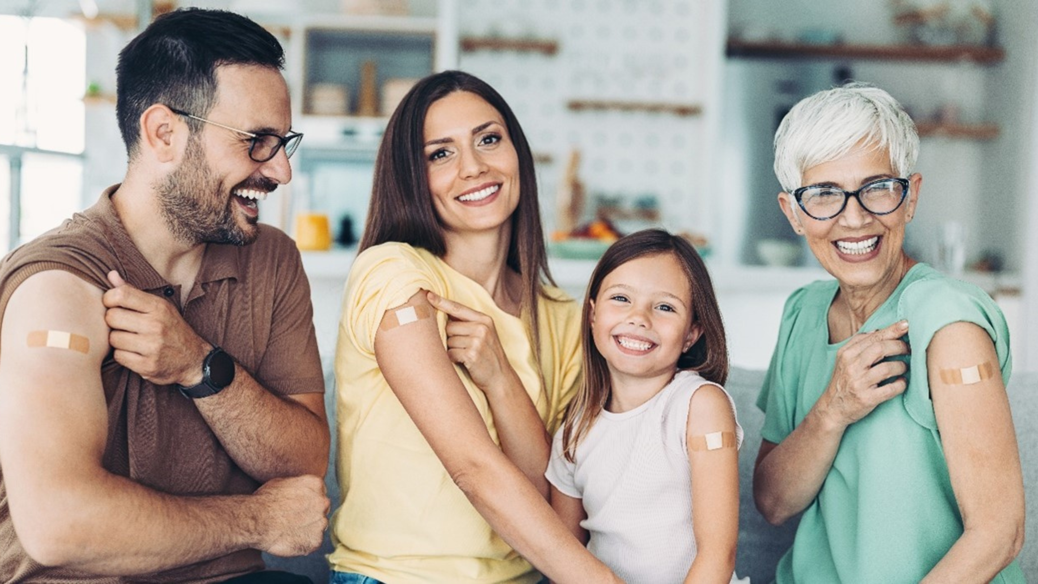 Family after vaccination with bandaids