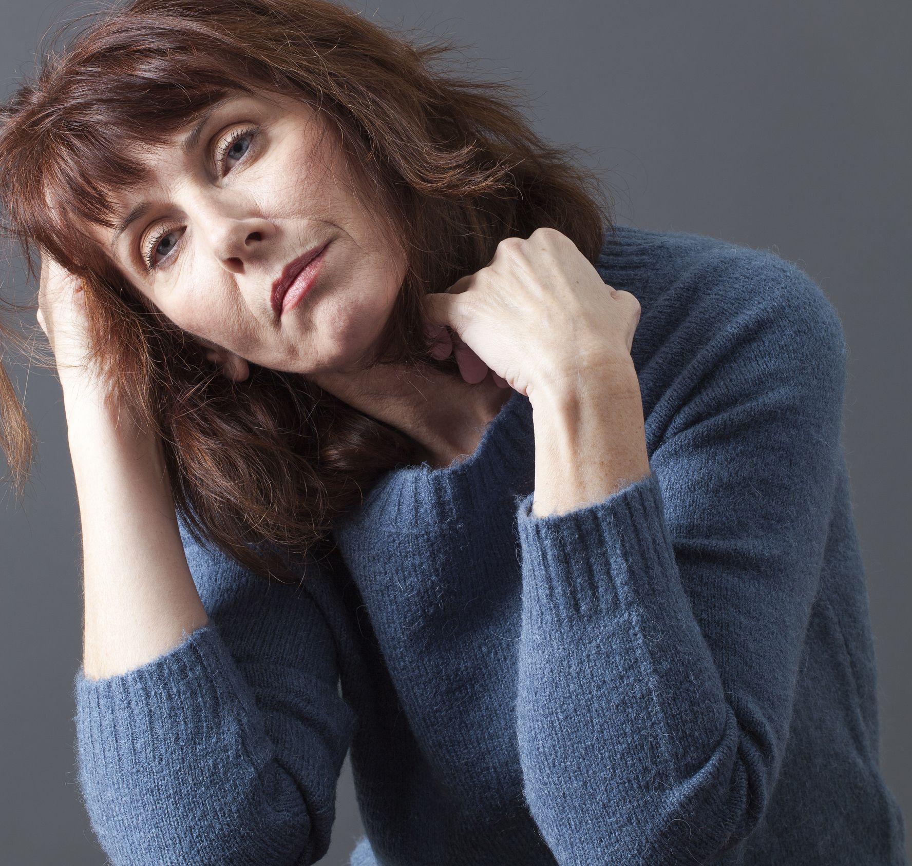 BHRT support for menopause – Rock Ridge Pharmacy Woman experiencing menopause symptoms seeking balance