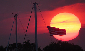 VA sunset with flag.PNG